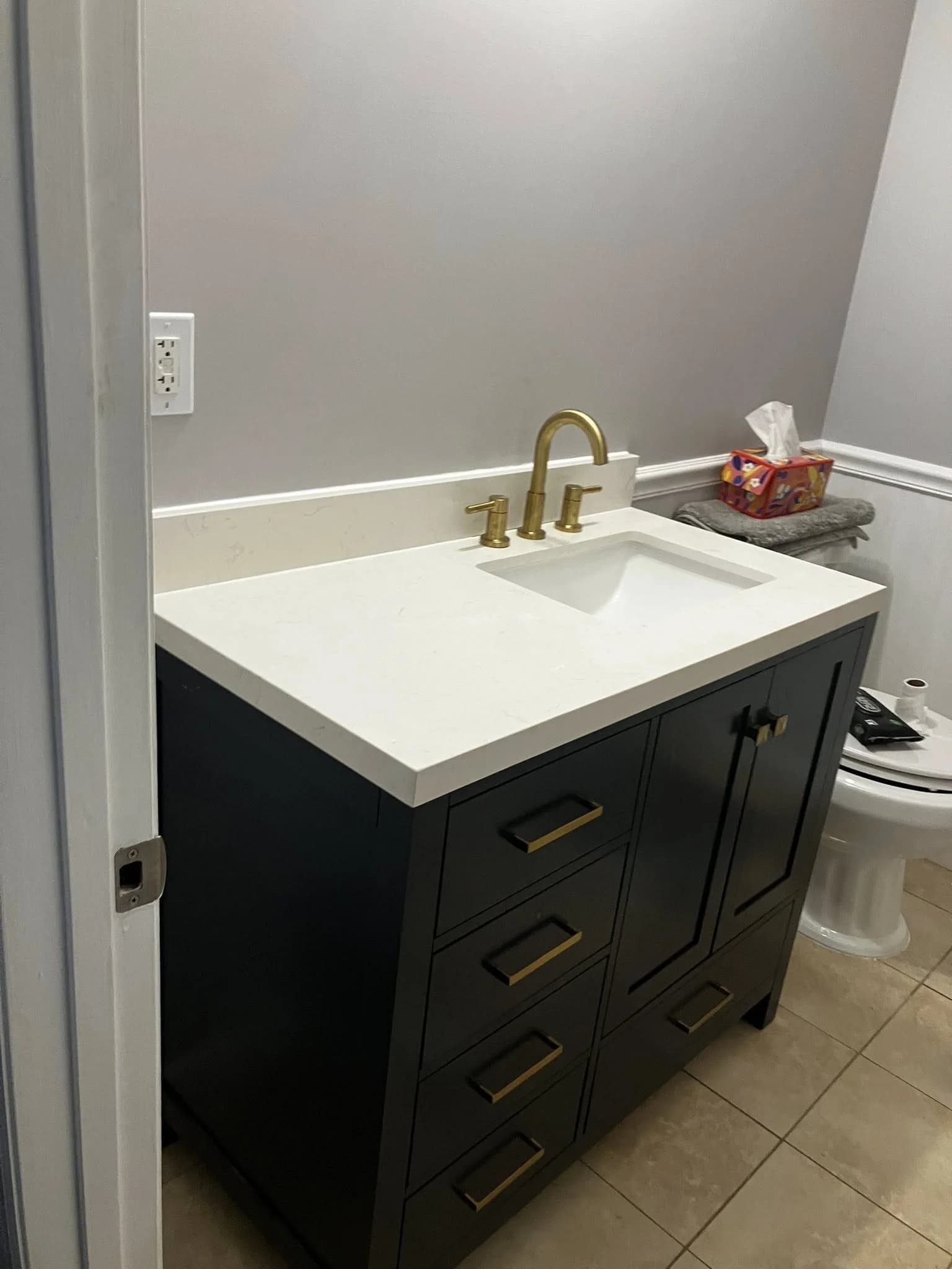 Finished bathroom vanity with quartz countertop