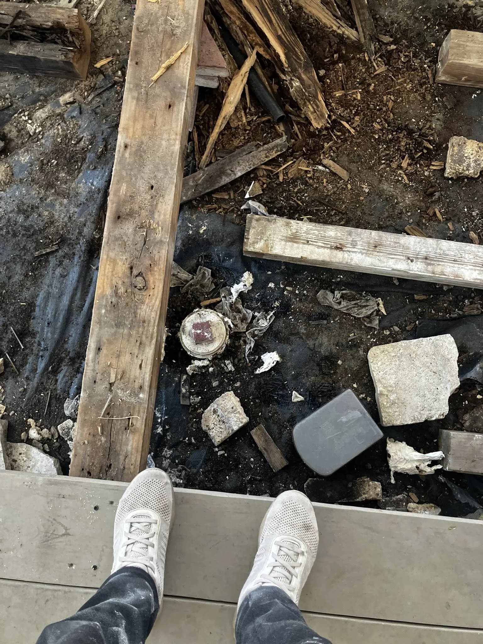 Debris discovered under old deck
