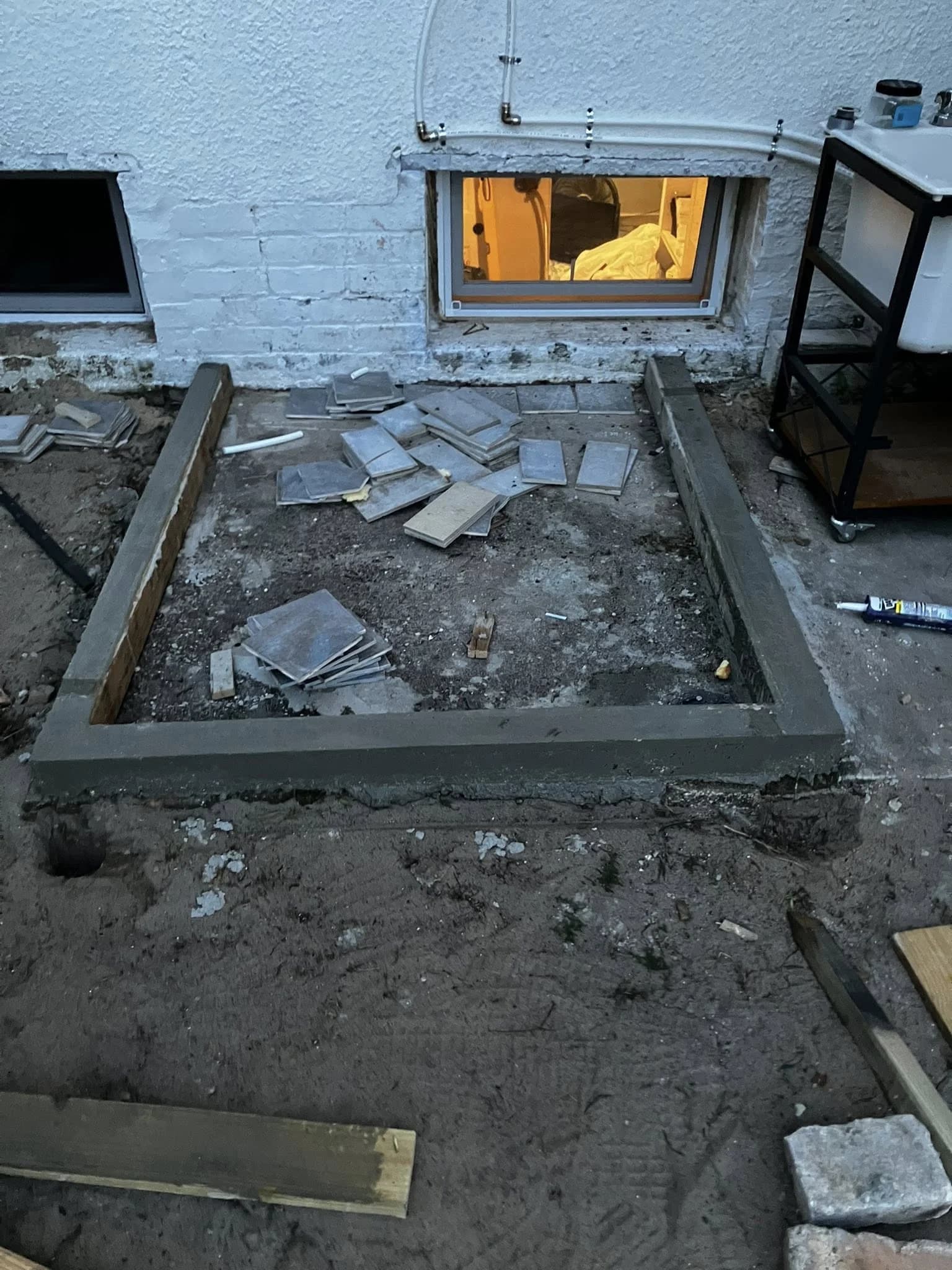 Patio tile installation progress