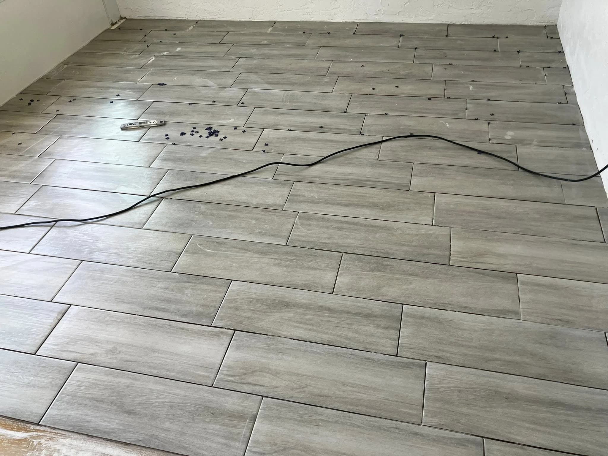 Plank floor installation progress