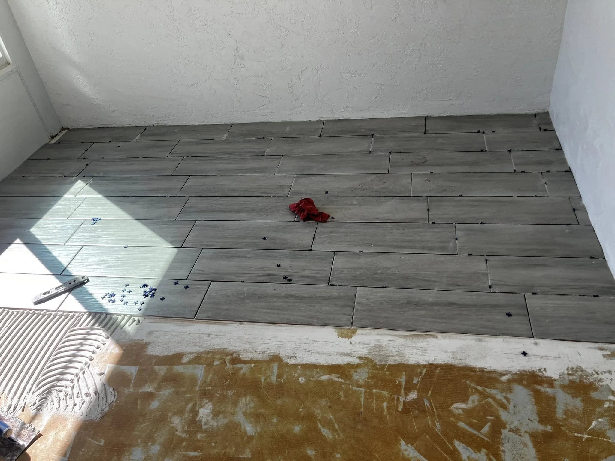 Tile installation halfway done