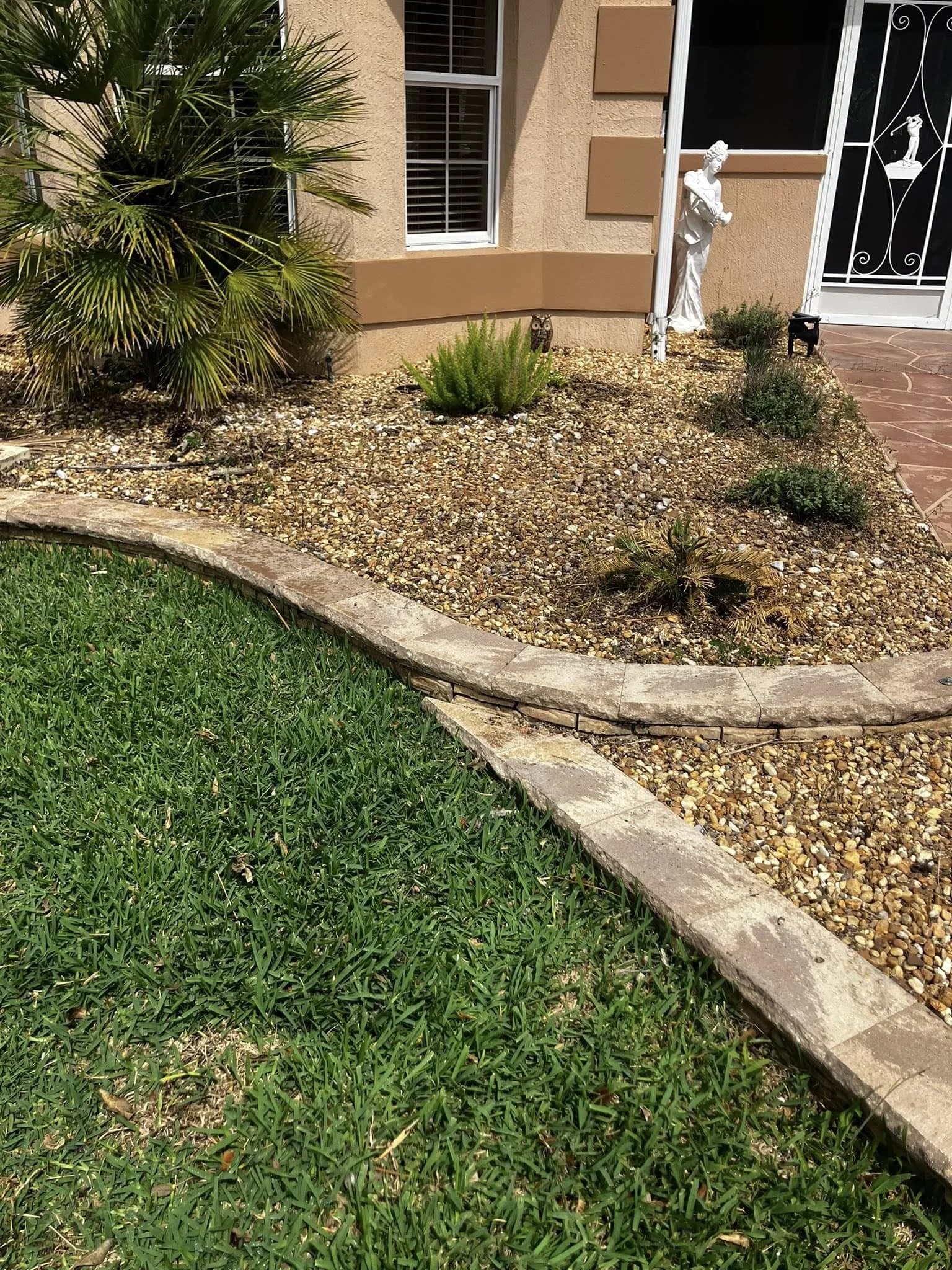 Xeriscape bed with stone accent