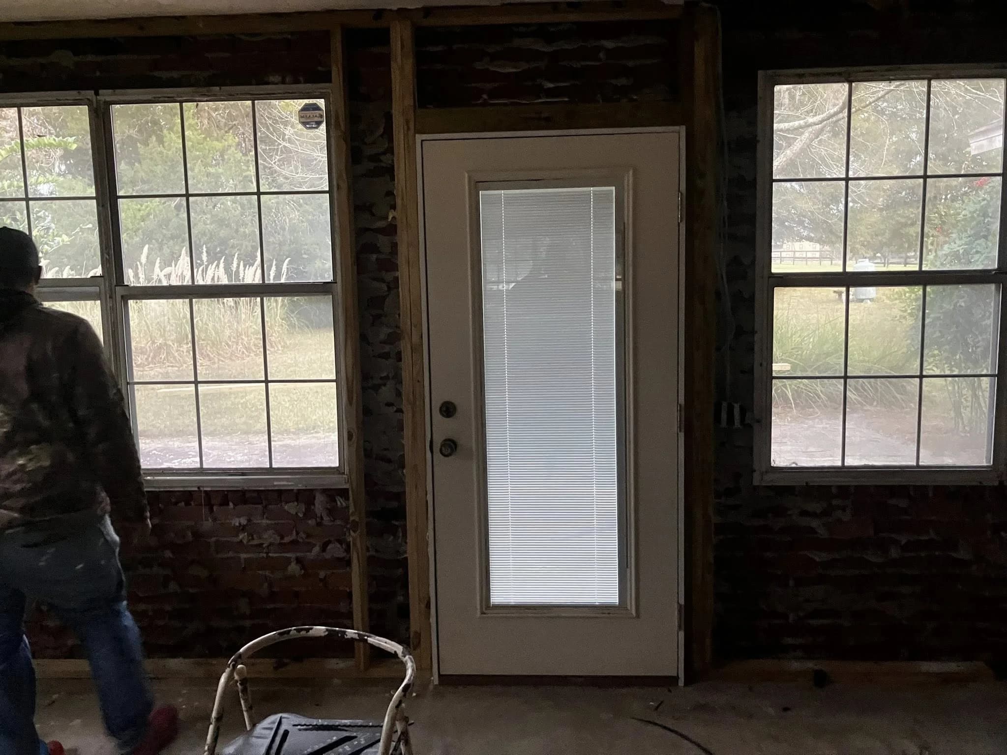 Door installation in brick exterior