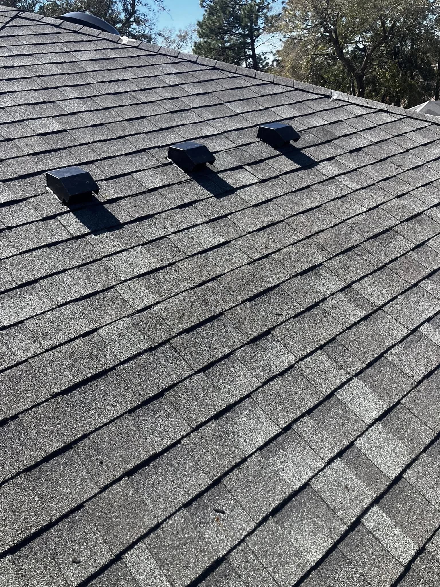 Inspecting roof shingles